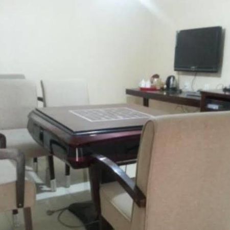 Xinhang Hotel Урумчи Экстерьер фото